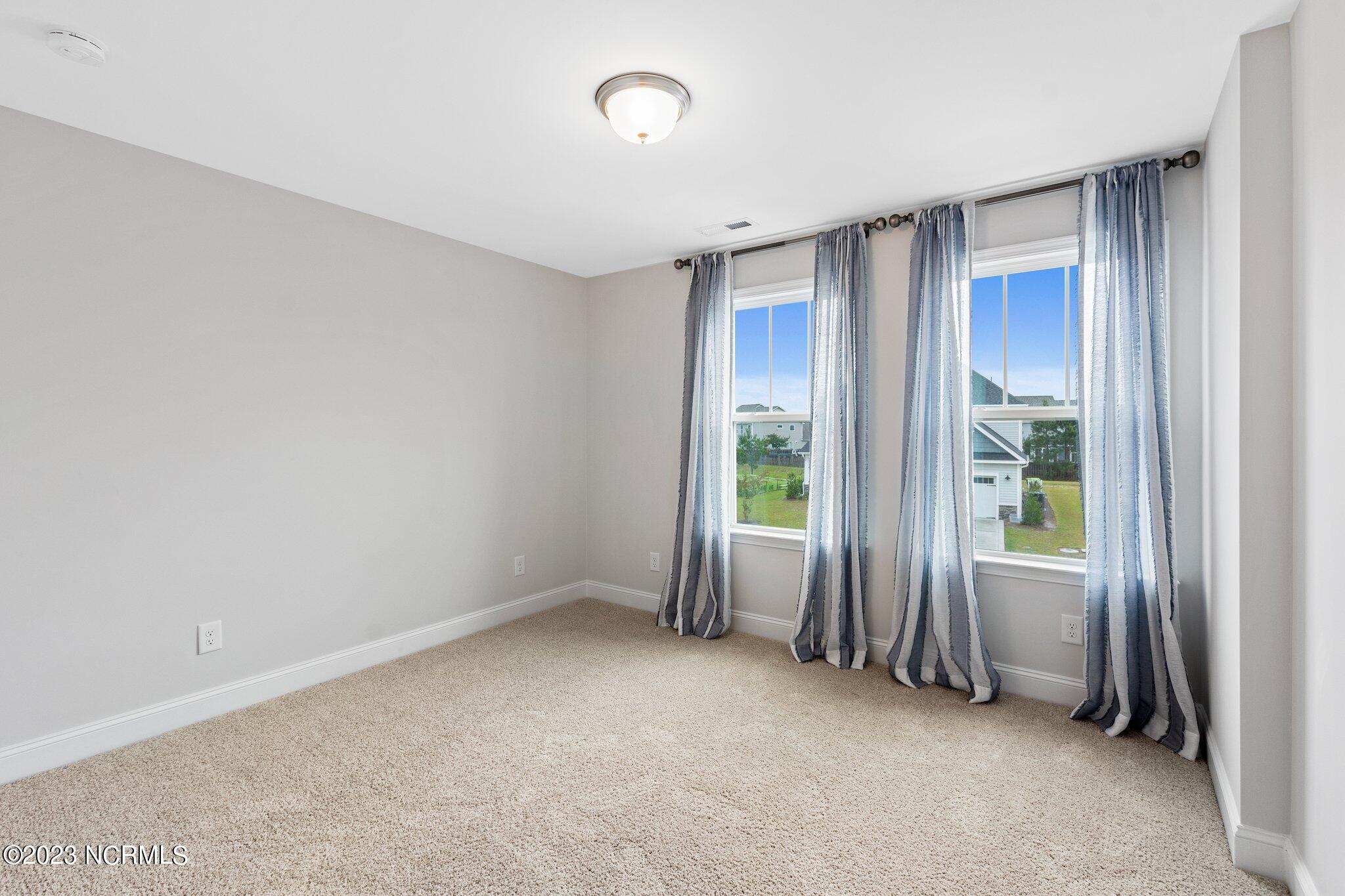 9060 Gardens Grove Road Leland, NC 28451 - Photo 15 of 28 BEDROOM 3