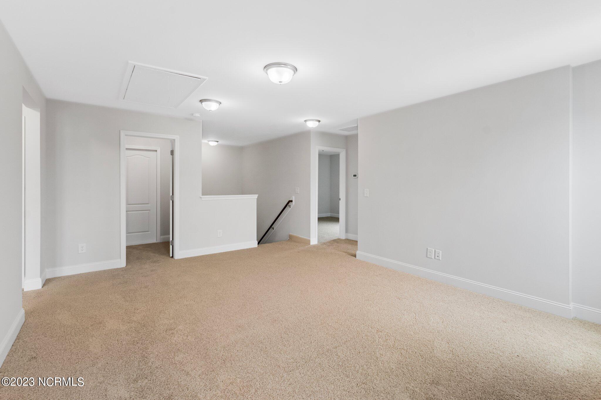9060 Gardens Grove Road Leland, NC 28451 - Photo 18 of 28 LOFT / FAMILY ROOM