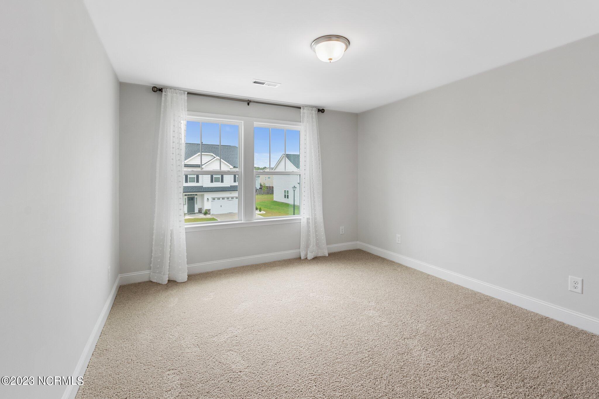 9060 Gardens Grove Road Leland, NC 28451 - Photo 19 of 28 BEDROOM 2