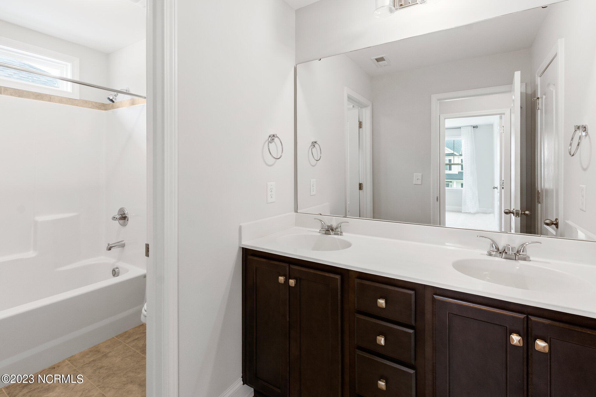 9060 Gardens Grove Road Leland, NC 28451 - Photo 21 of 28 BATHROOM 2