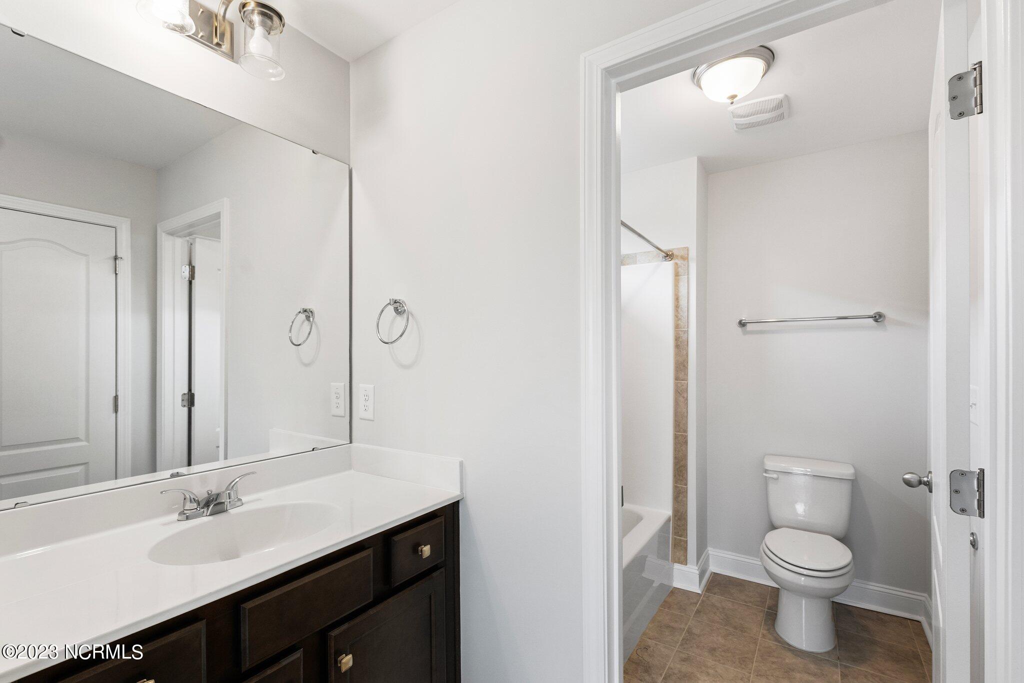 9060 Gardens Grove Road Leland, NC 28451 - Photo 22 of 28 BATHROOM 2
