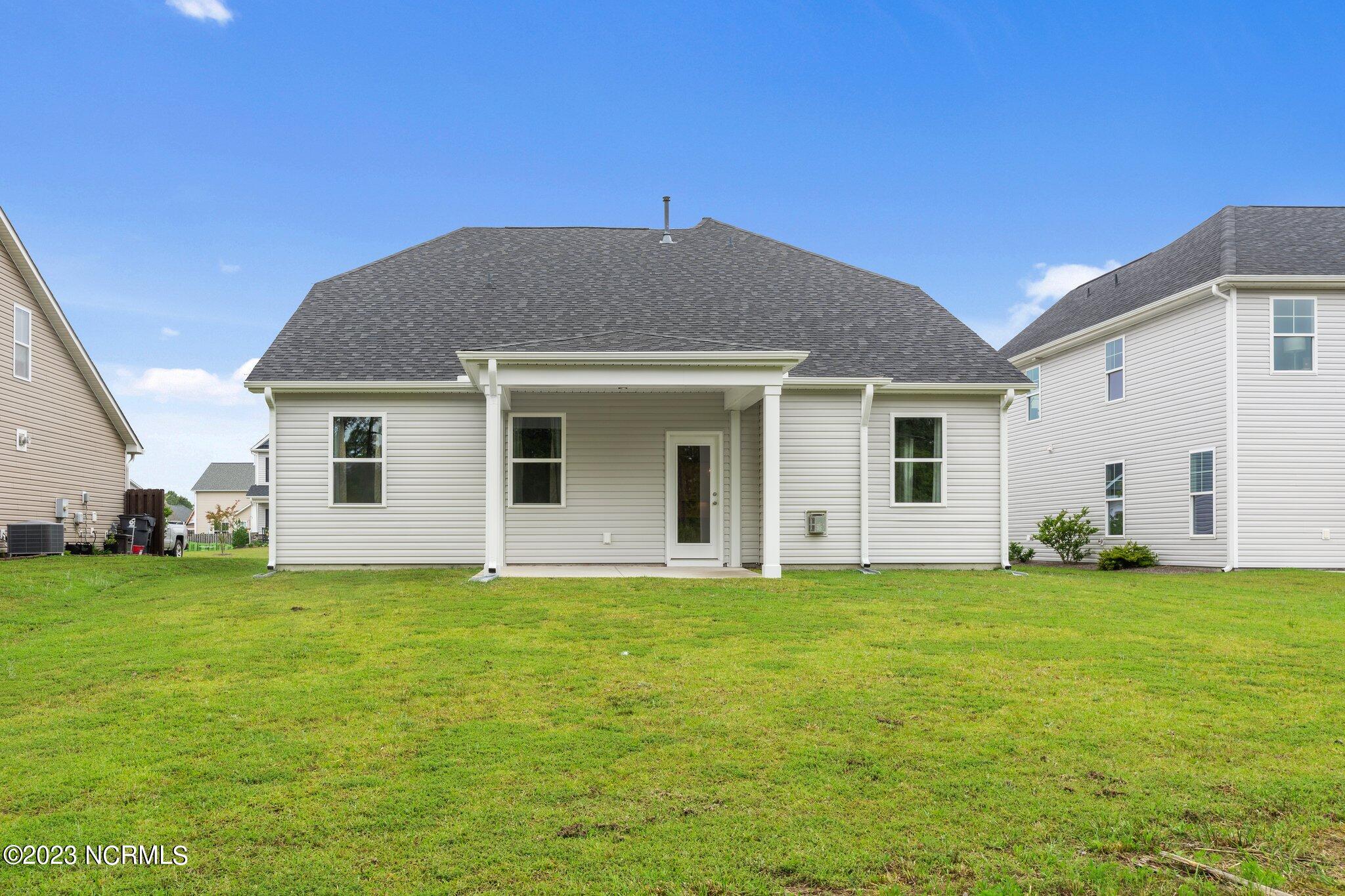 9060 Gardens Grove Road Leland, NC 28451 - Photo 24 of 28 REAR VIEW