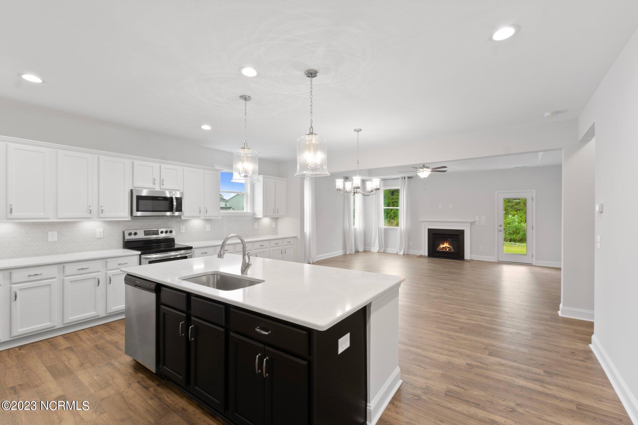 9060 Gardens Grove Road Leland, NC 28451 - Photo 6 of 28 LOWER LEVEL