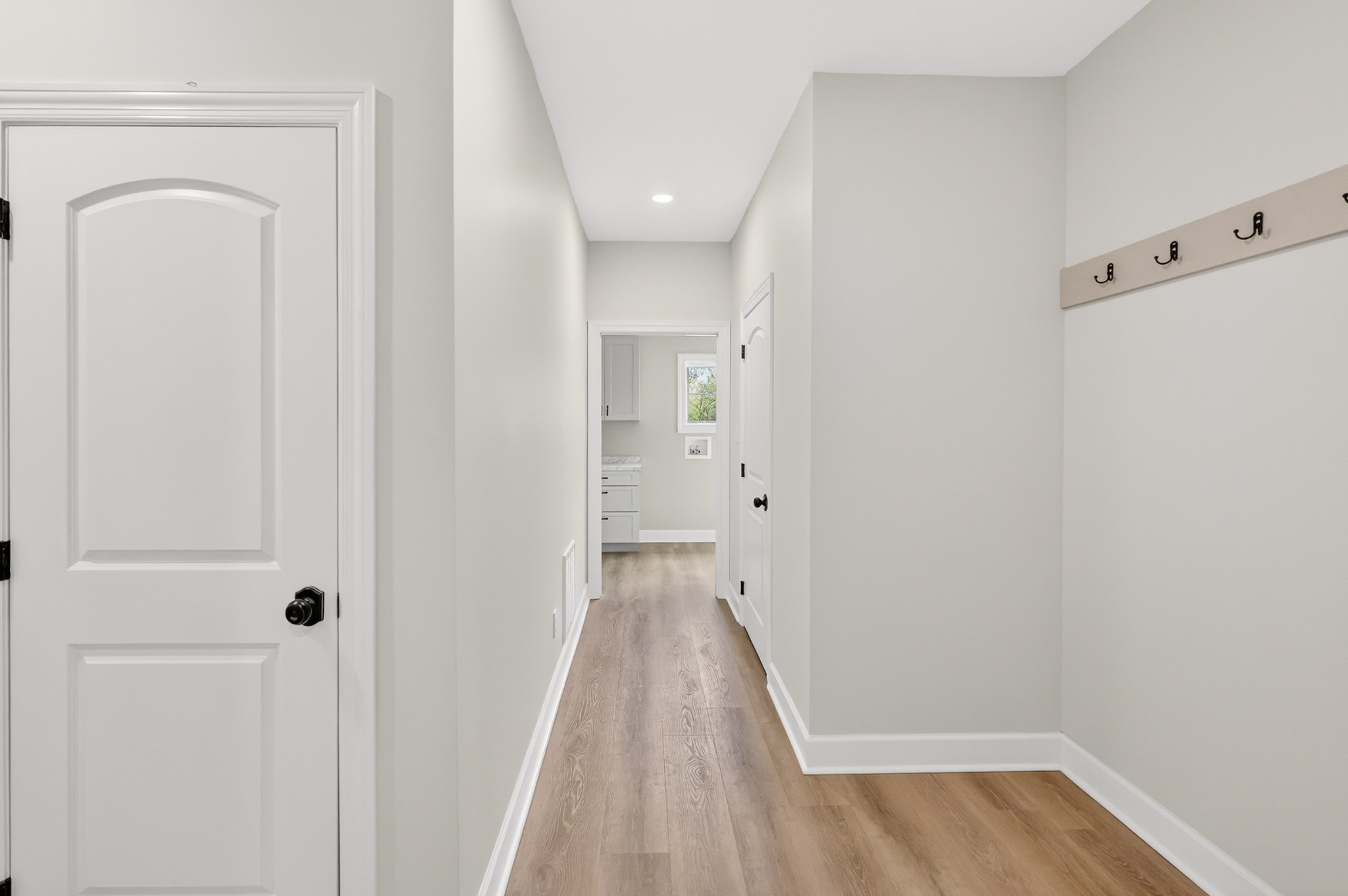 8415 West Sheepneck Road Mount Pleasant, TN 38474 - Photo 20 of 40 a view of a hallway with wooden floor