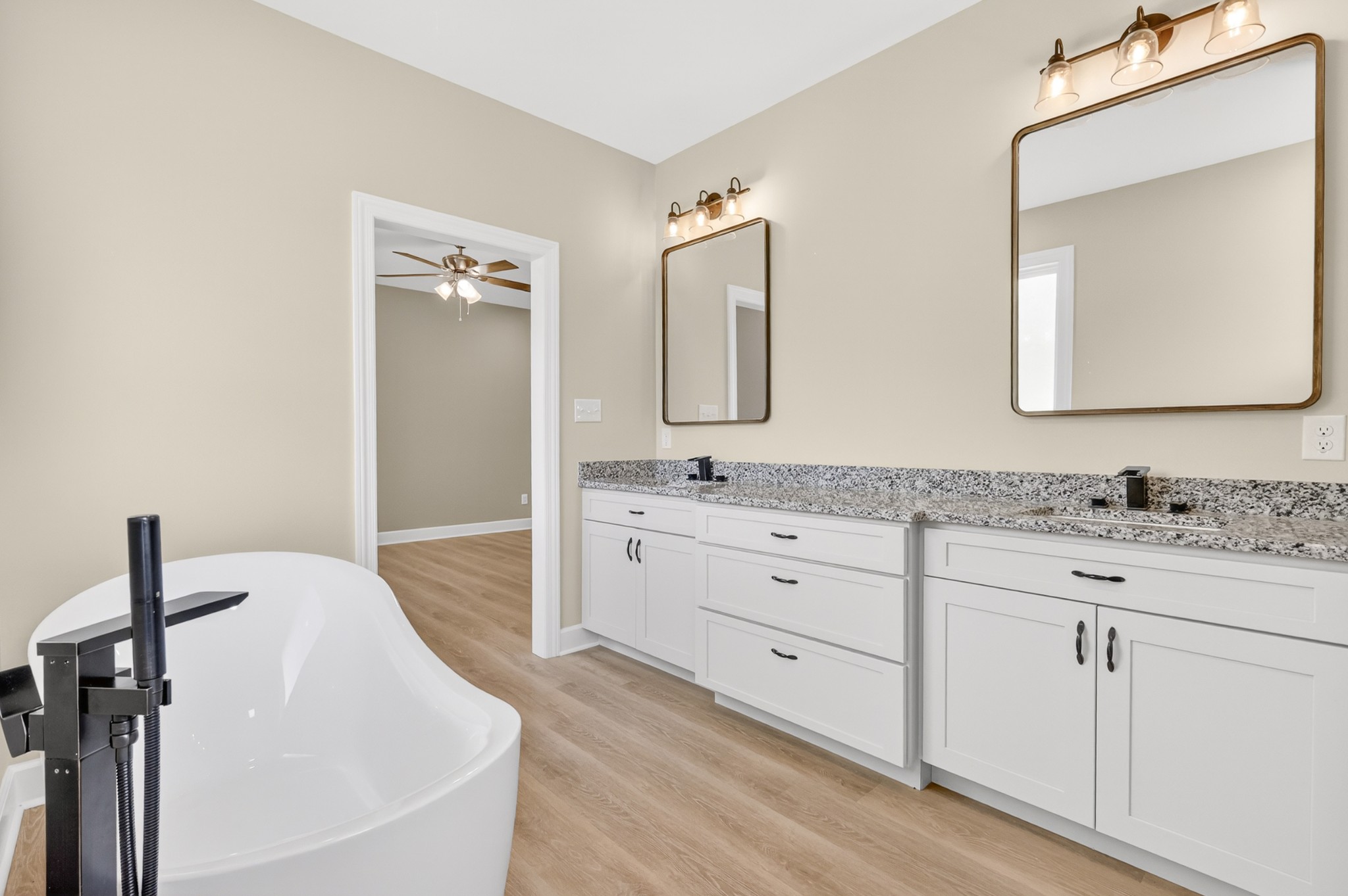 8415 West Sheepneck Road Mount Pleasant, TN 38474 - Photo 24 of 40 a bathroom with a sink and a mirror