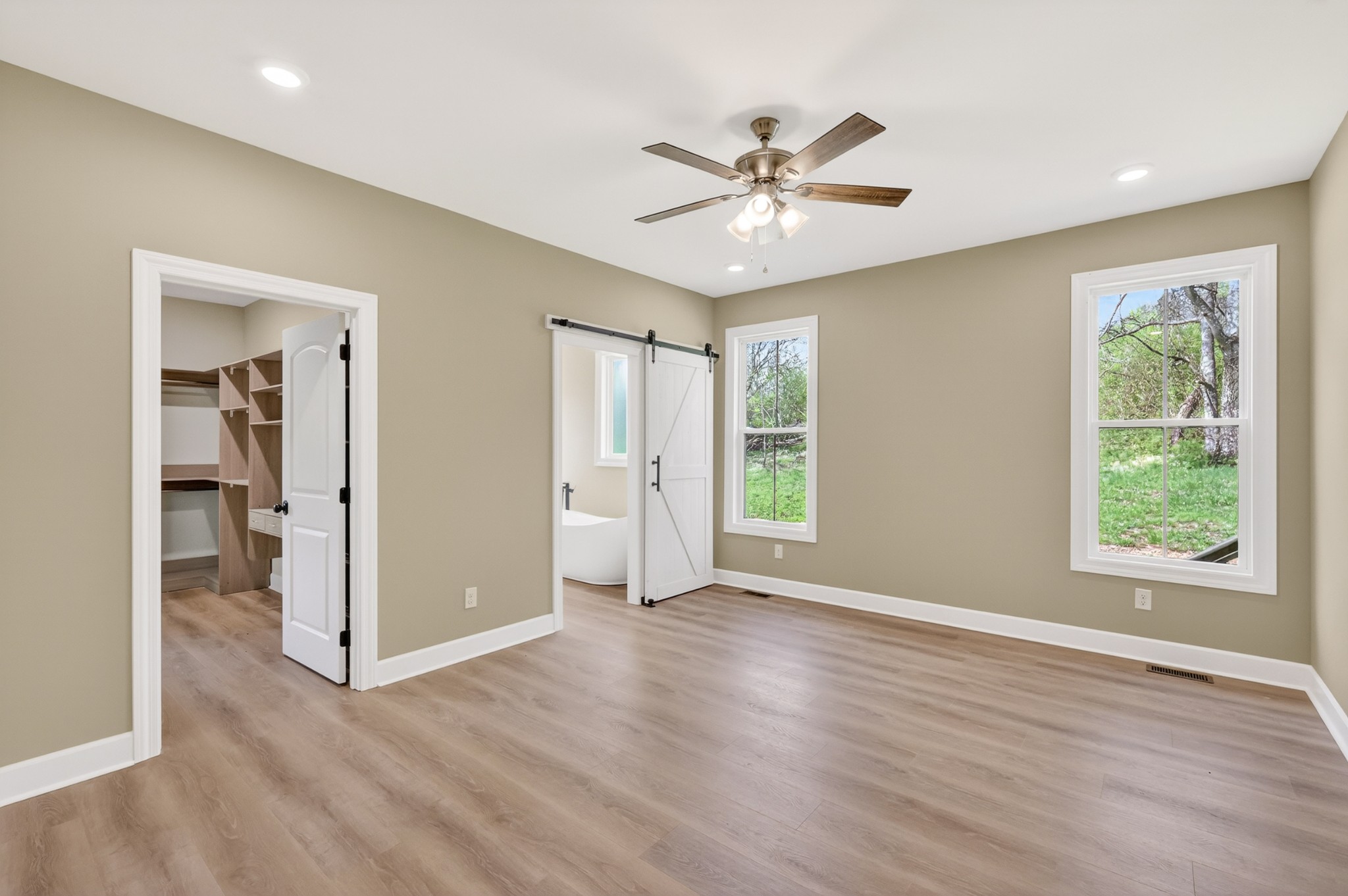 8415 West Sheepneck Road Mount Pleasant, TN 38474 - Photo 29 of 40 wooden floor in an empty room with a window