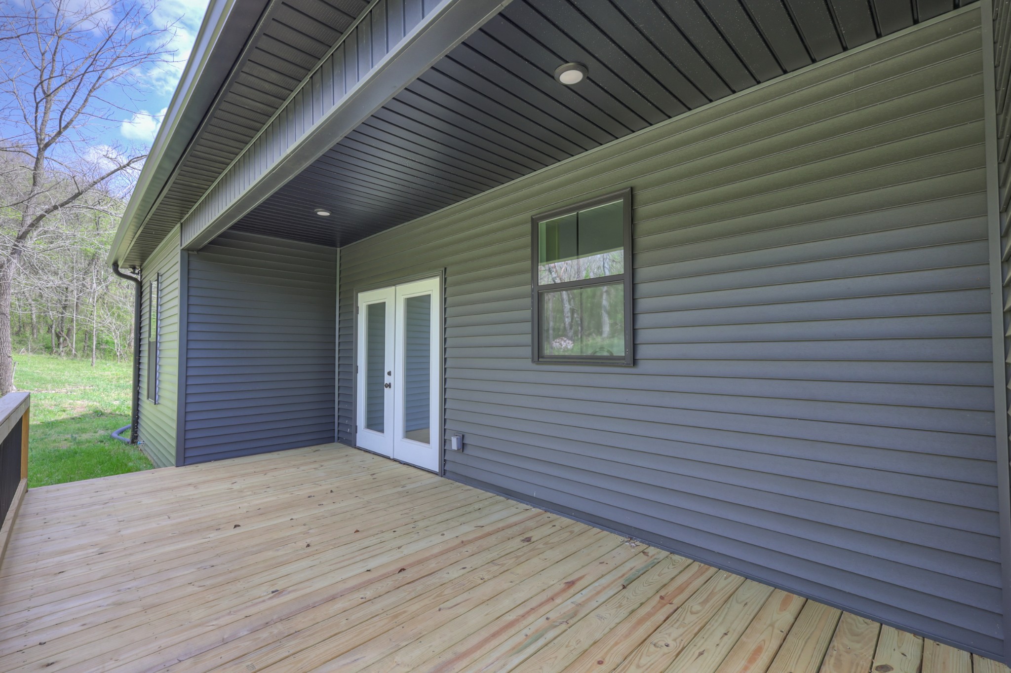 8415 West Sheepneck Road Mount Pleasant, TN 38474 - Photo 35 of 40 a view of a backyard of house