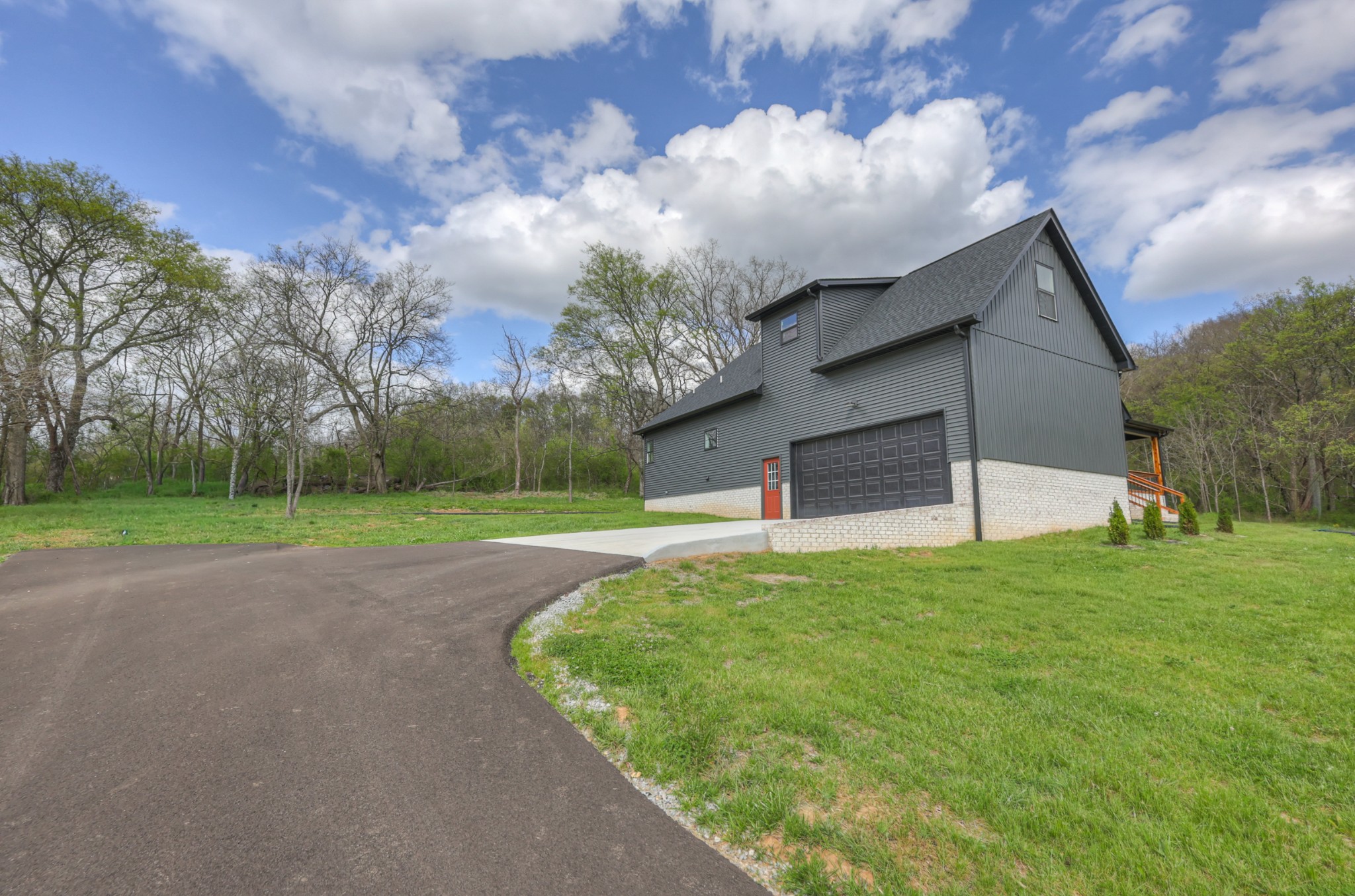 8415 West Sheepneck Road Mount Pleasant, TN 38474 - Photo 39 of 40 a view of a house with a yard
