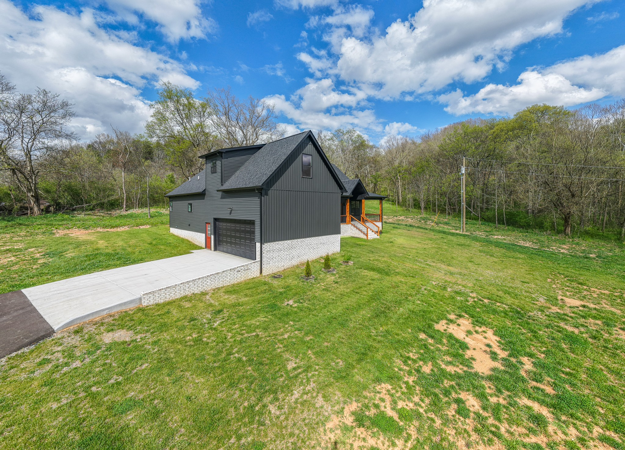 8415 West Sheepneck Road Mount Pleasant, TN 38474 - Photo 10 of 40 a view of a house with a yard