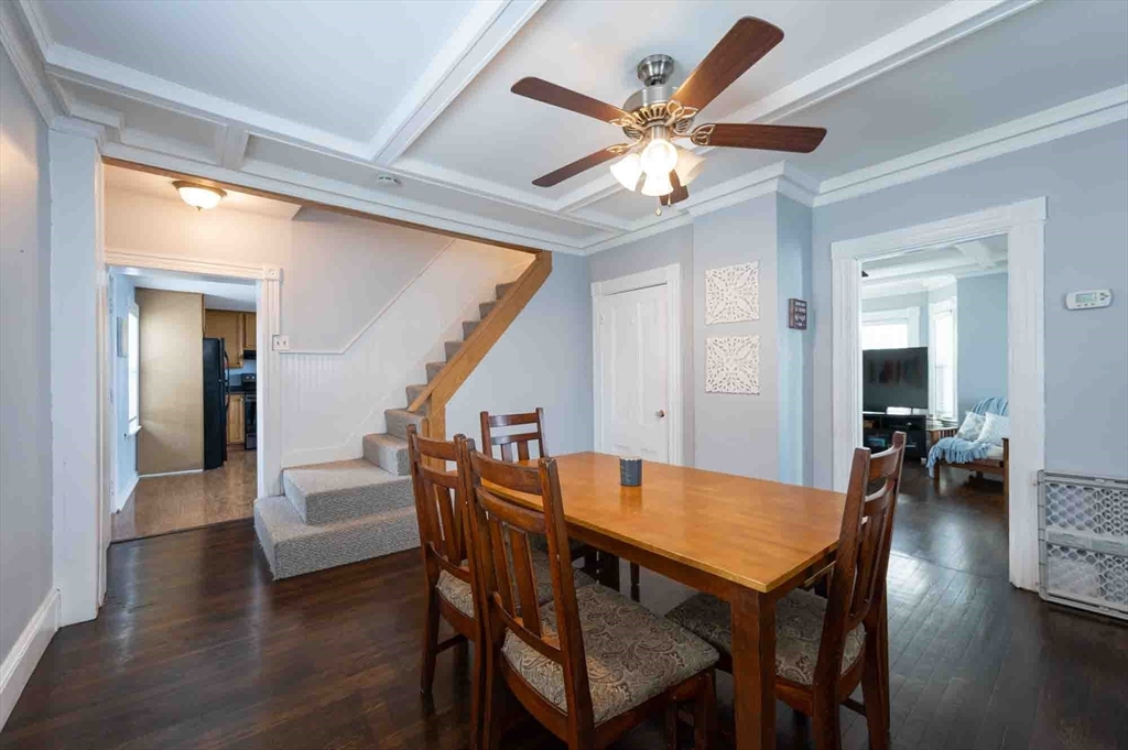 6 Monroe Court Gloucester, MA 01930 - Photo 11 of 41 a view of a dining room with furniture and wooden floor