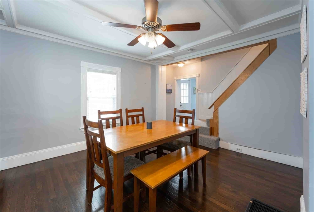 6 Monroe Court Gloucester, MA 01930 - Photo 12 of 41 a view of a dining room with furniture and wooden floor