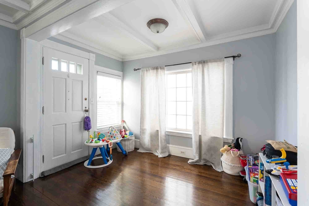 6 Monroe Court Gloucester, MA 01930 - Photo 17 of 41 a living room with furniture and a window
