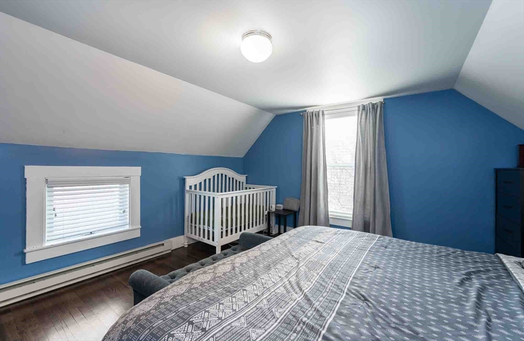 6 Monroe Court Gloucester, MA 01930 - Photo 21 of 41 a bedroom with a bed and a window