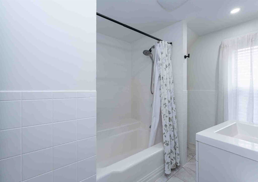 6 Monroe Court Gloucester, MA 01930 - Photo 27 of 41 a bathroom with a shower a toilet and a sink