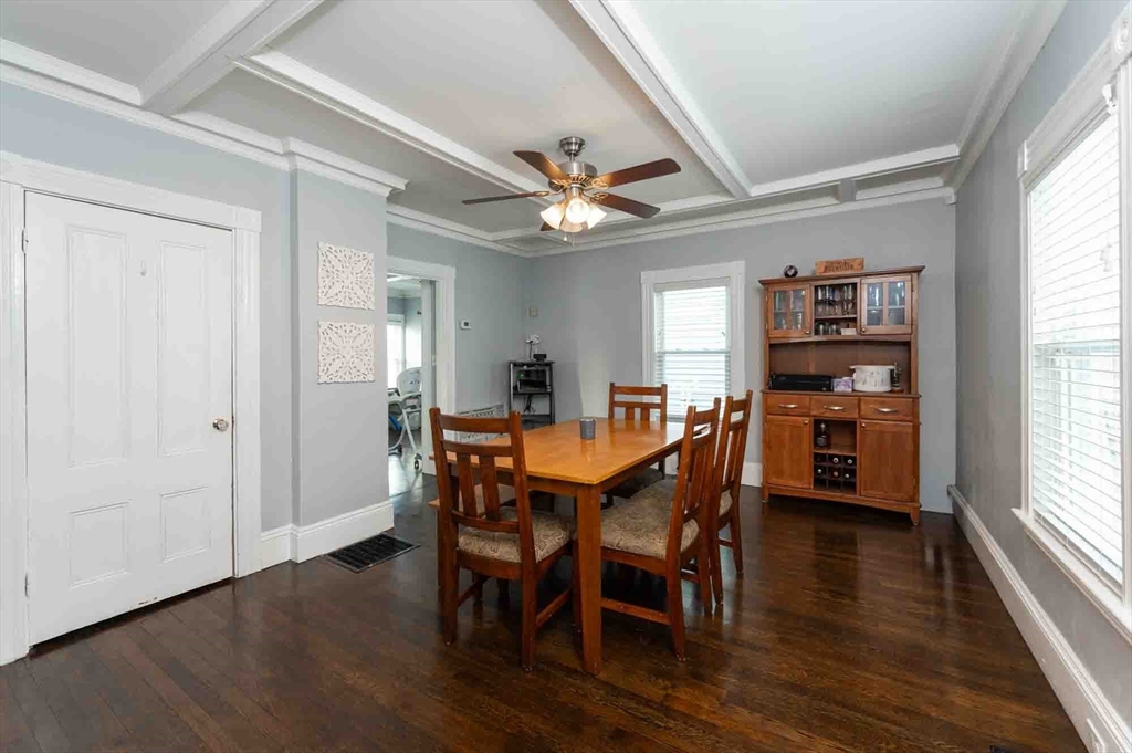 6 Monroe Court Gloucester, MA 01930 - Photo 9 of 41 a view of a dining room with furniture window and wooden floor