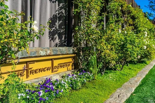 a view of a bench in a backyard