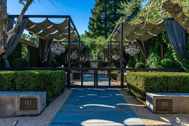 a view of a garden with a fountain and a garden