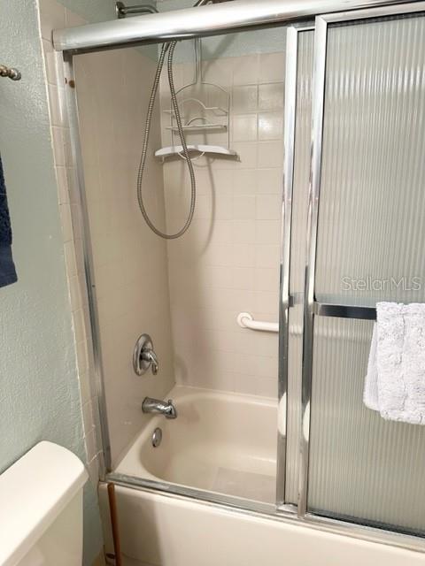 7701 Starkey Road, Unit 731 Seminole, FL 33777 - Photo 8 of 19 a bathroom with a bath tub and a shower