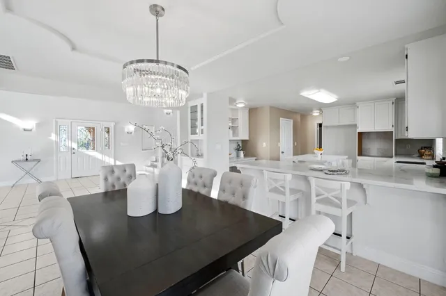 a bathroom with a double vanity sink mirror and double