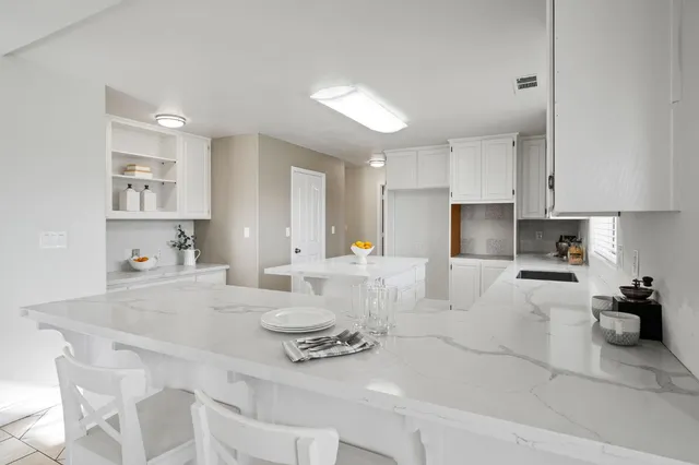 a bathroom with a shower and toilet