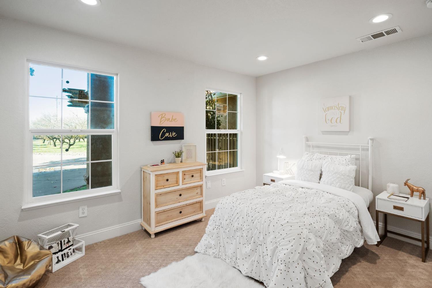 6312 Skittone Road Modesto, CA 95356 - Photo 26 of 93 a bedroom with a bed and a window