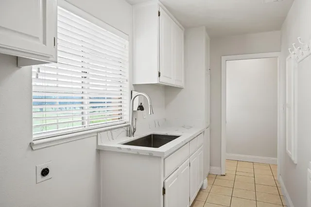 a living room with furniture and decor