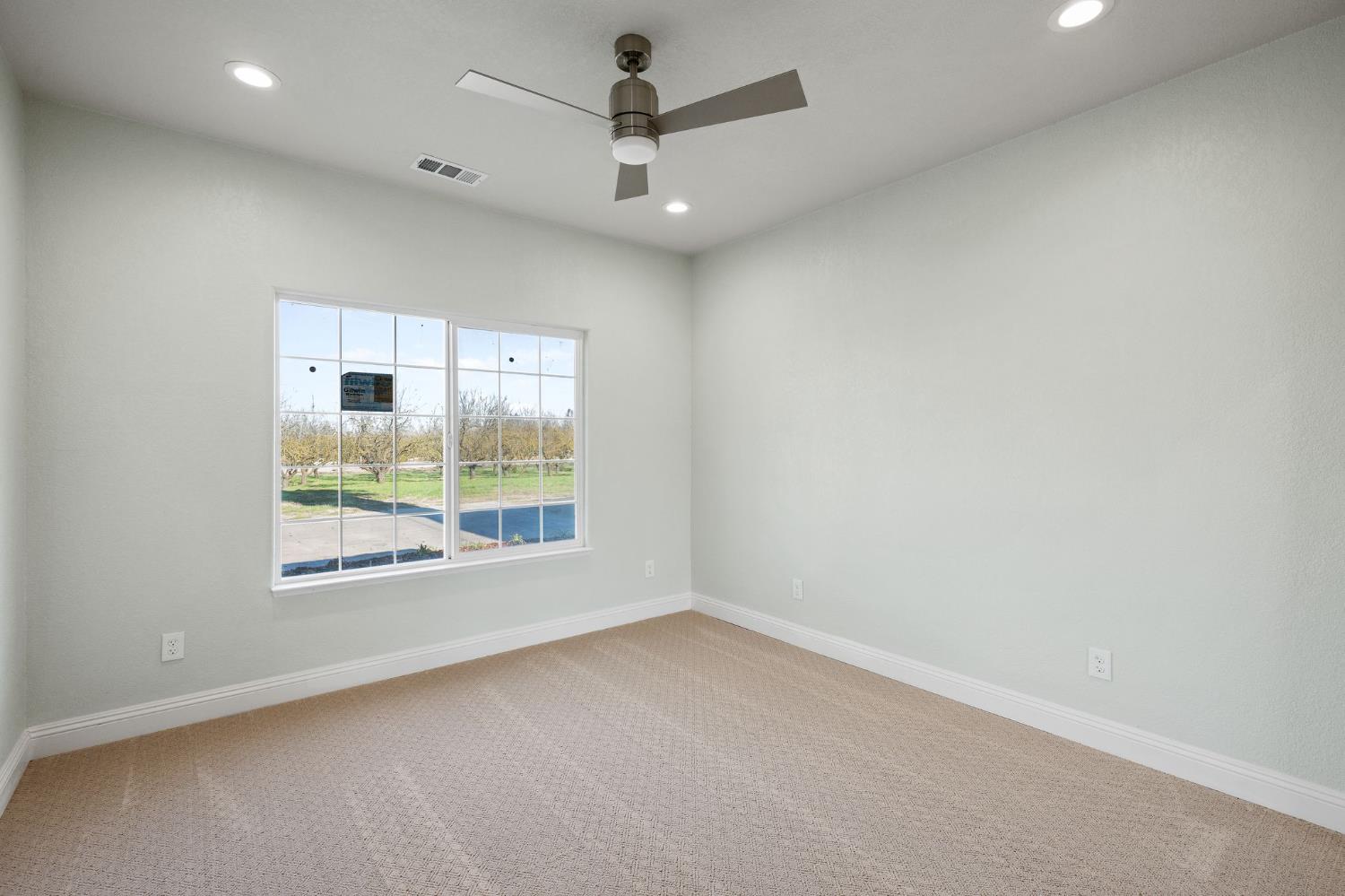 6312 Skittone Road Modesto, CA 95356 - Photo 32 of 93 an empty room with a window