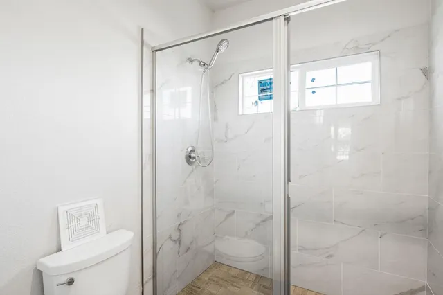 a view of a backyard with garden