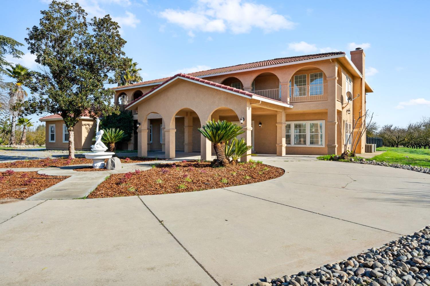 6312 Skittone Road Modesto, CA 95356 - Photo 4 of 93 a front view of a house with a yard