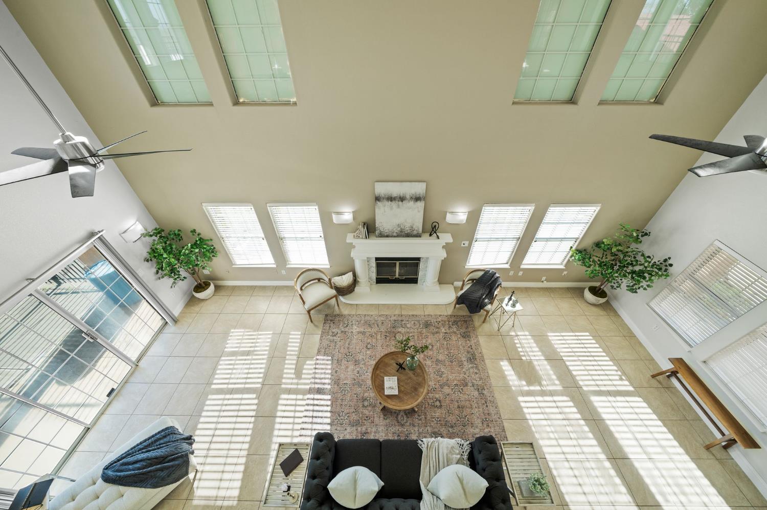 6312 Skittone Road Modesto, CA 95356 - Photo 42 of 93 a living room with furniture and a fireplace