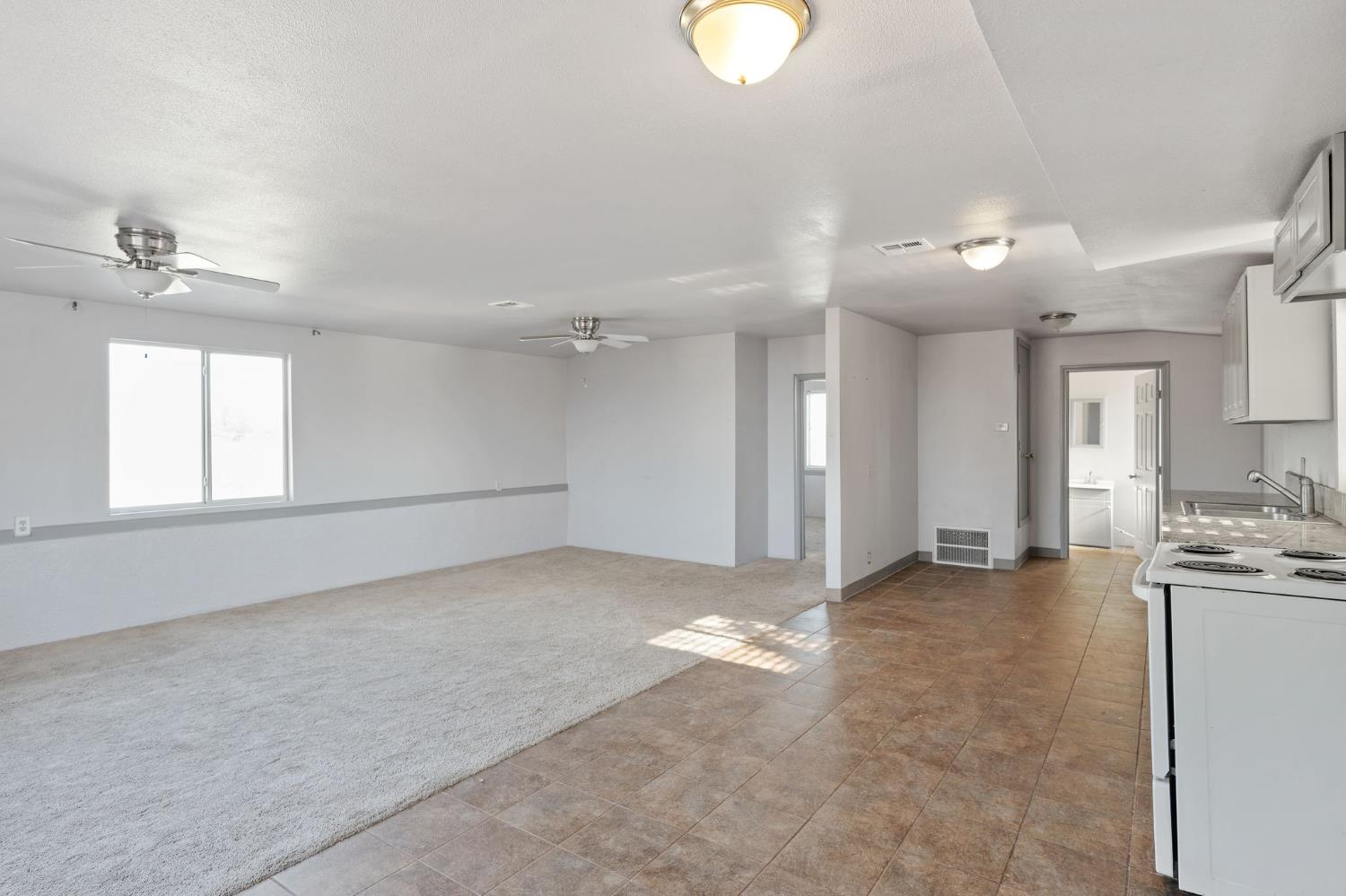 6312 Skittone Road Modesto, CA 95356 - Photo 64 of 93 a view of a livingroom with a stove