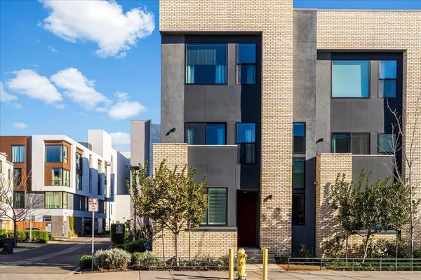 a front view of a building with street view