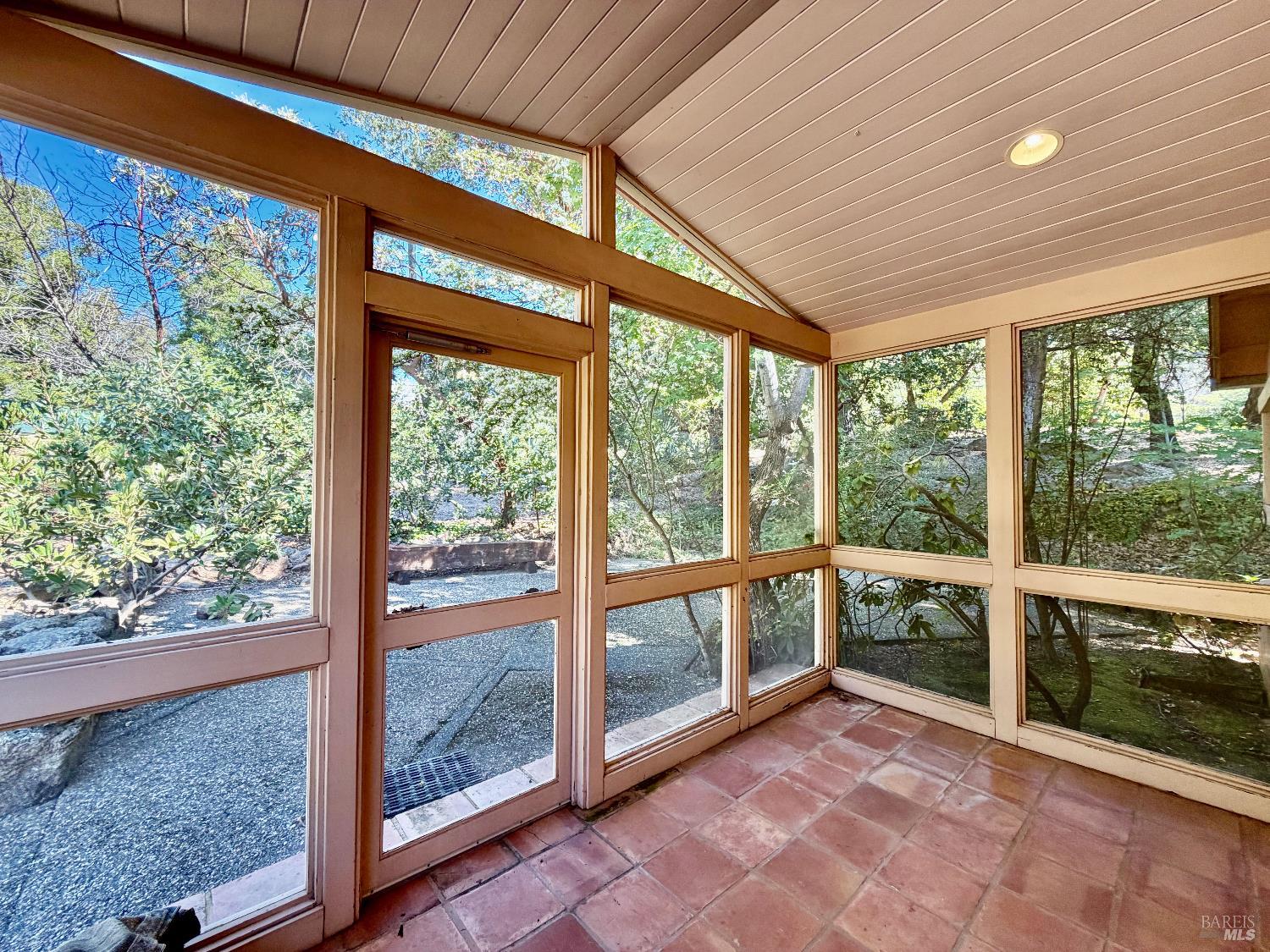 321 Dutch Henry Canyon Road Calistoga, CA 94515 - Photo 11 of 50 a view of an empty room with large windows