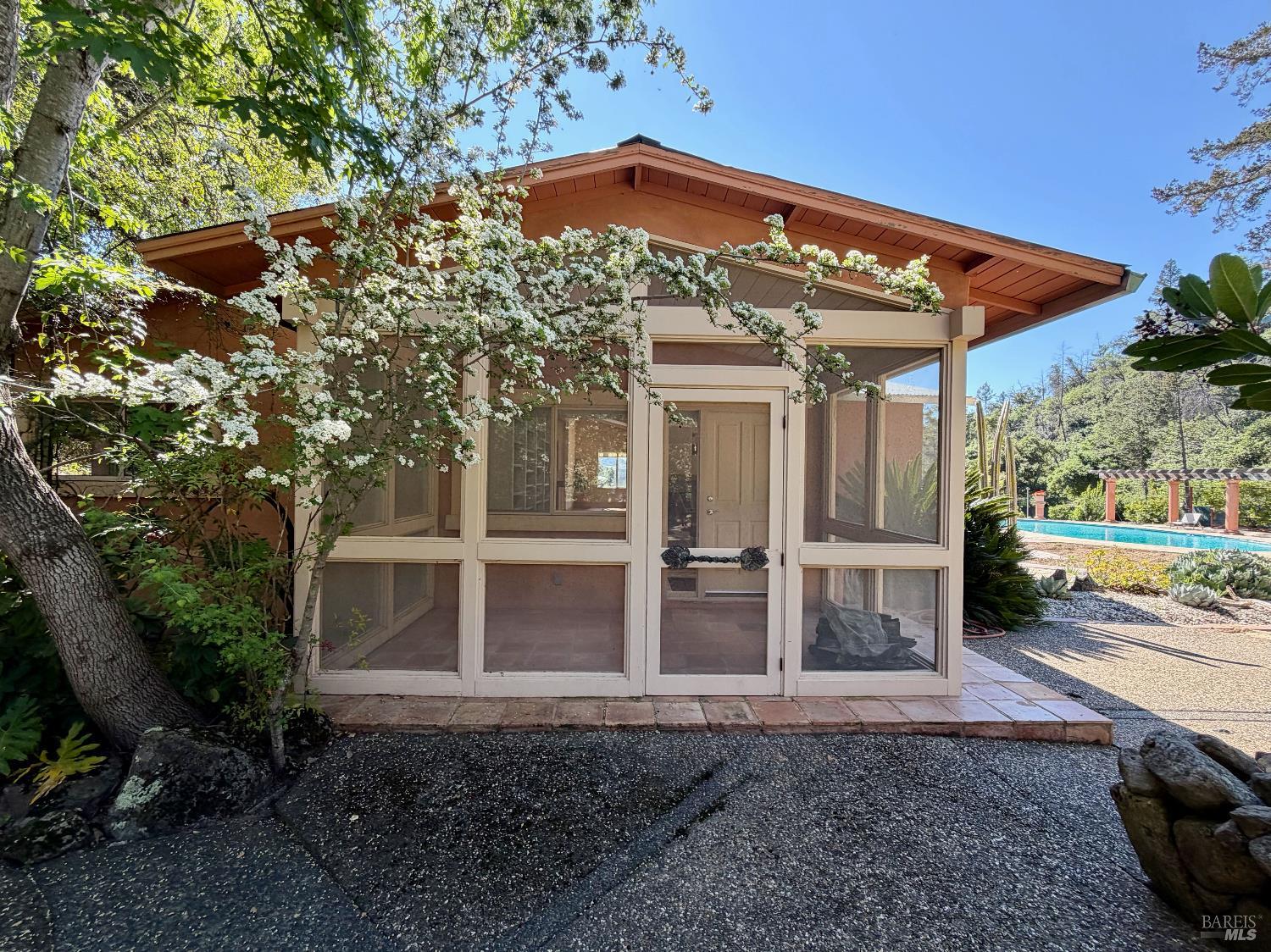 321 Dutch Henry Canyon Road Calistoga, CA 94515 - Photo 12 of 50 a front view of a house with garden