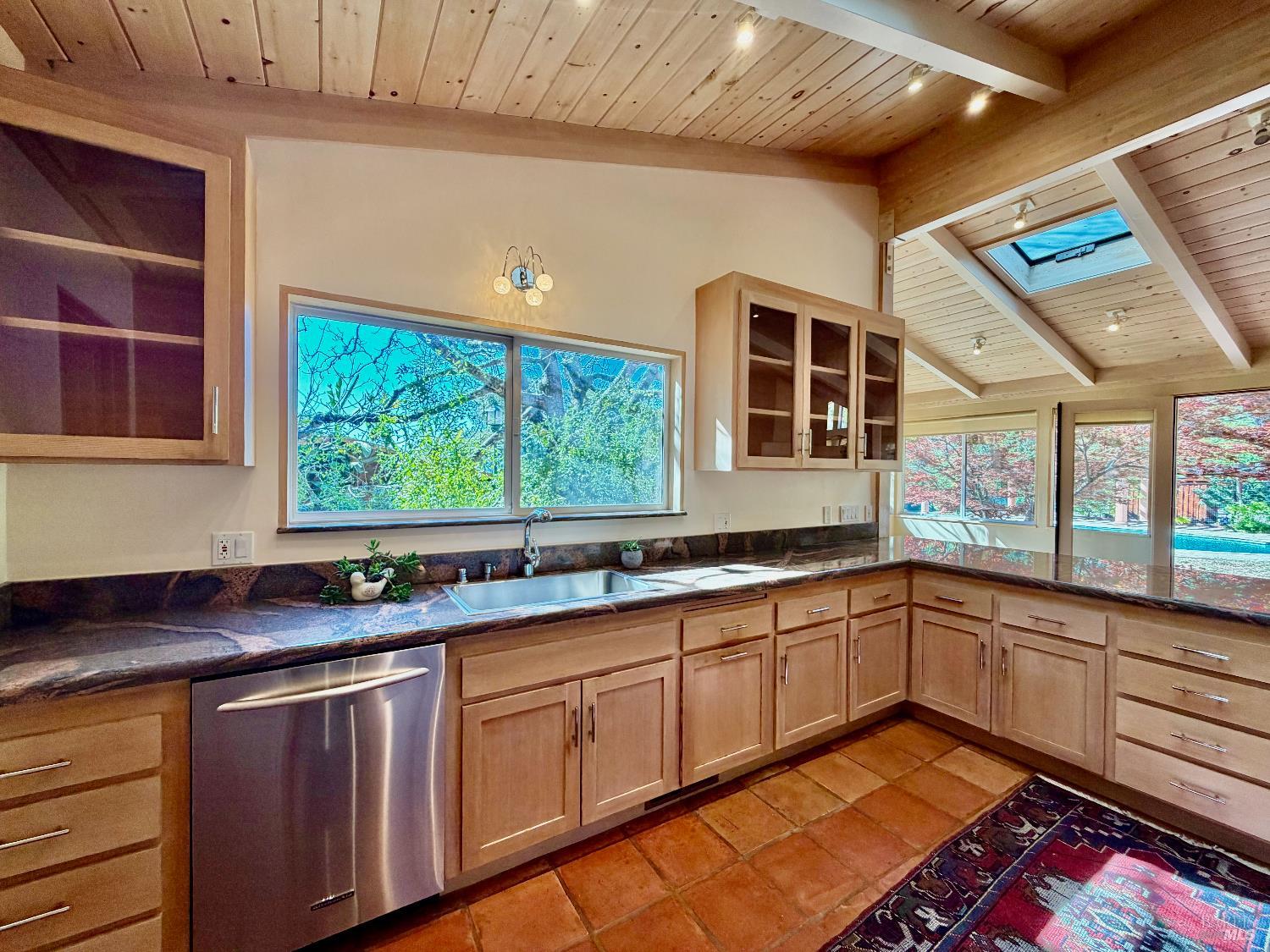 321 Dutch Henry Canyon Road Calistoga, CA 94515 - Photo 14 of 50 a kitchen with a sink and large window