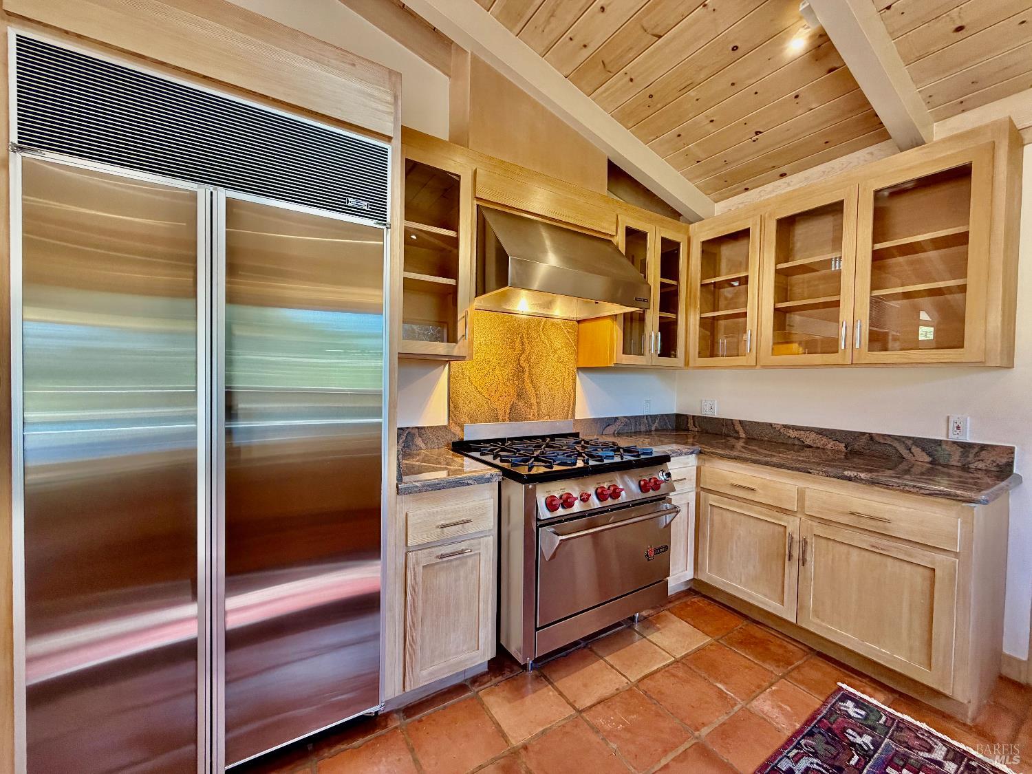 321 Dutch Henry Canyon Road Calistoga, CA 94515 - Photo 16 of 50 a kitchen with stainless steel appliances granite countertop a stove and a refrigerator