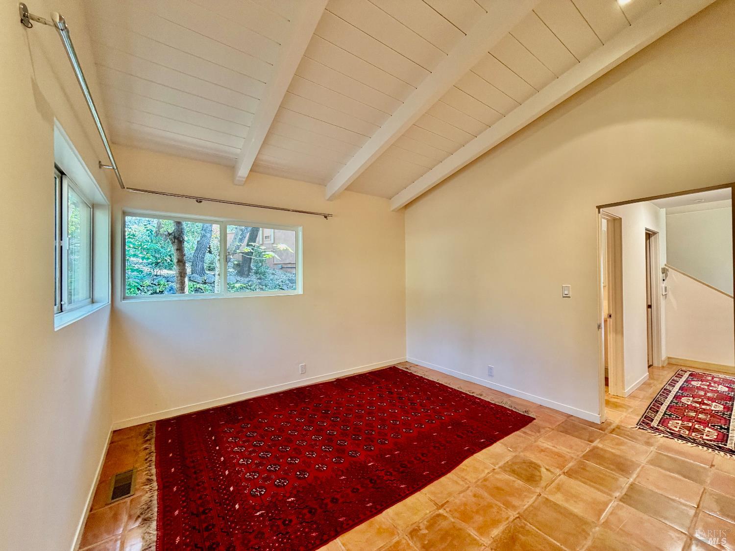 321 Dutch Henry Canyon Road Calistoga, CA 94515 - Photo 18 of 50 a bedroom with a bed and a window