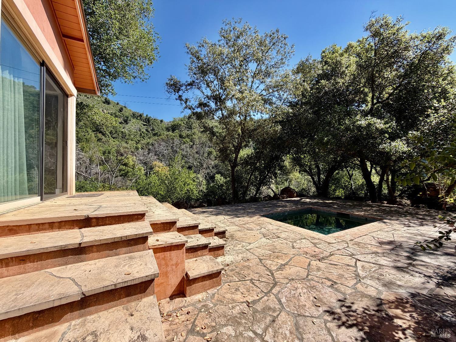321 Dutch Henry Canyon Road Calistoga, CA 94515 - Photo 27 of 50 a view of backyard with swimming pool and outdoor seating