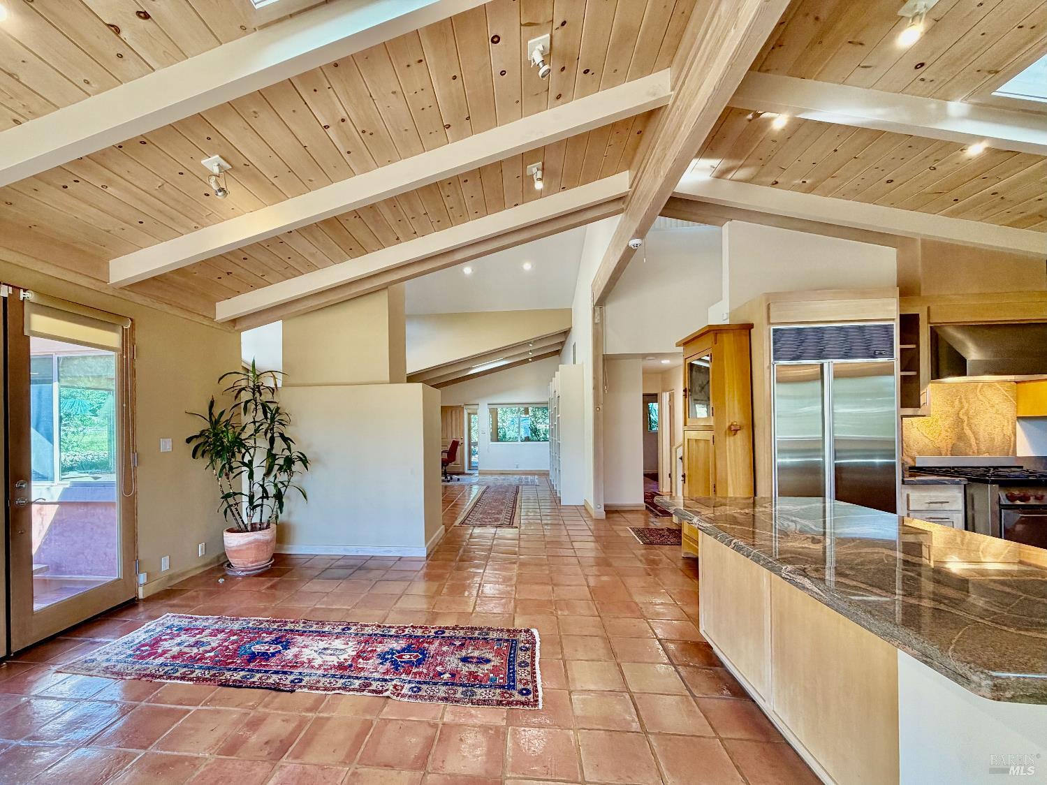 321 Dutch Henry Canyon Road Calistoga, CA 94515 - Photo 6 of 50 a hallway with a large mirror and a table