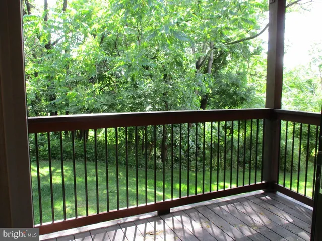 a view of a porch with a yard