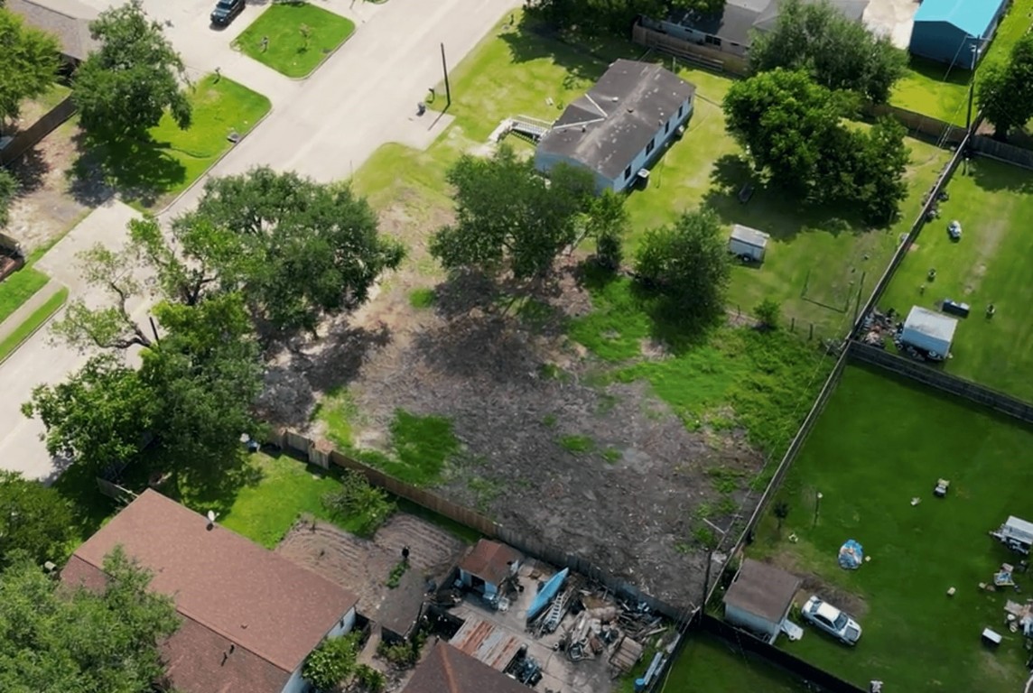 306 Present Street Stafford, TX 77477 - Photo 4 of 6 an aerial view of a house with a yard