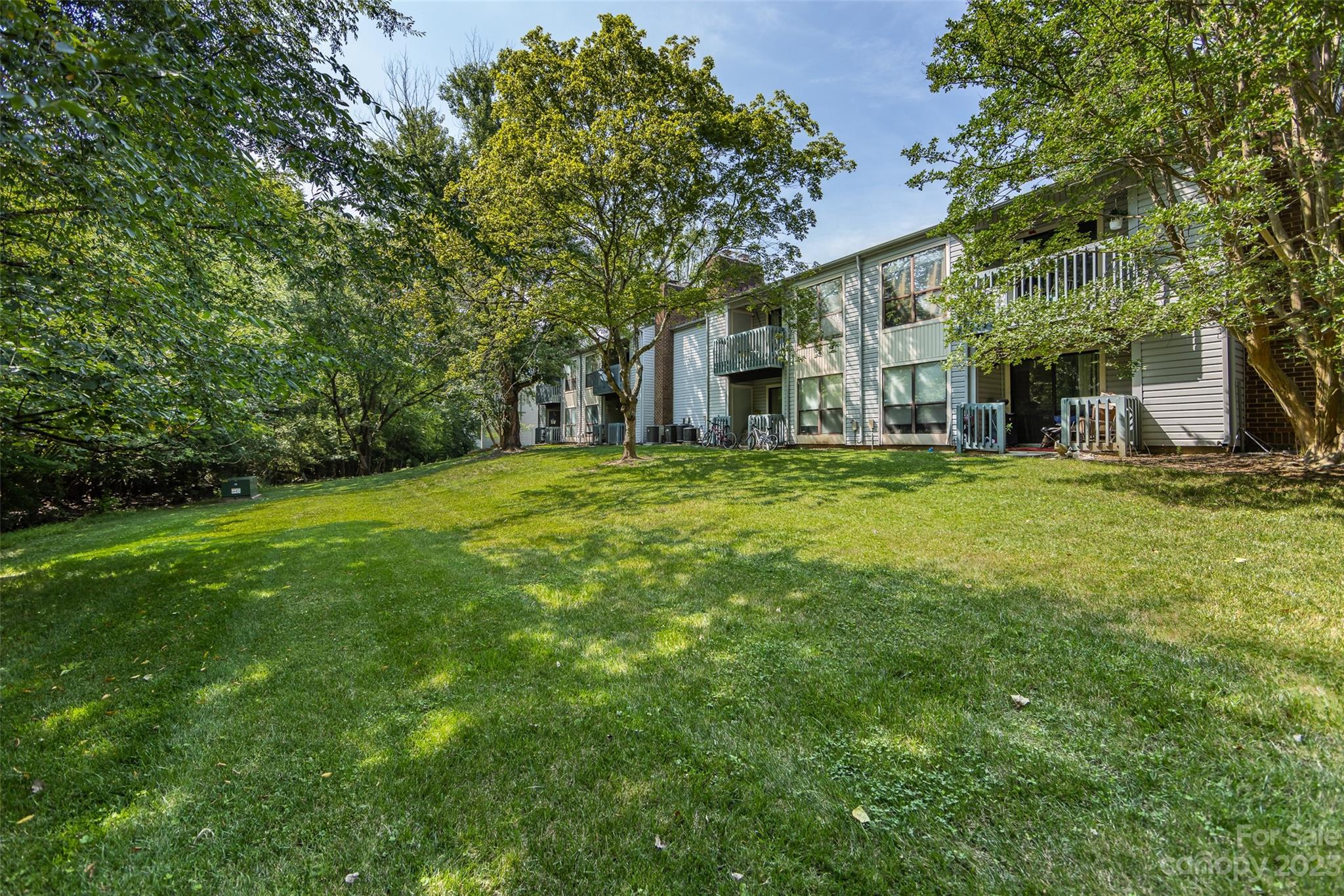 11114 Harrowfield Road Charlotte, NC 28226 - Photo 22 of 25 a view of a house with a big yard