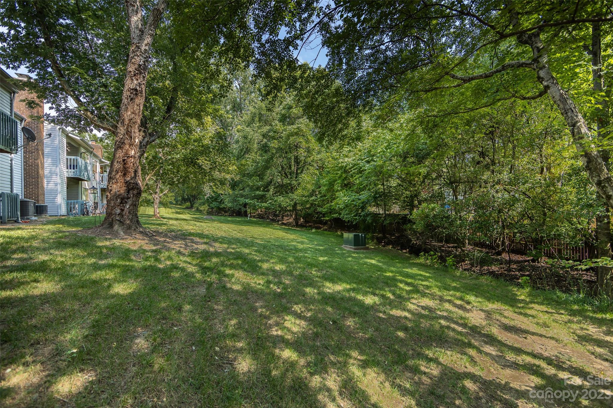 11114 Harrowfield Road Charlotte, NC 28226 - Photo 24 of 25 a view of outdoor space with deck and yard
