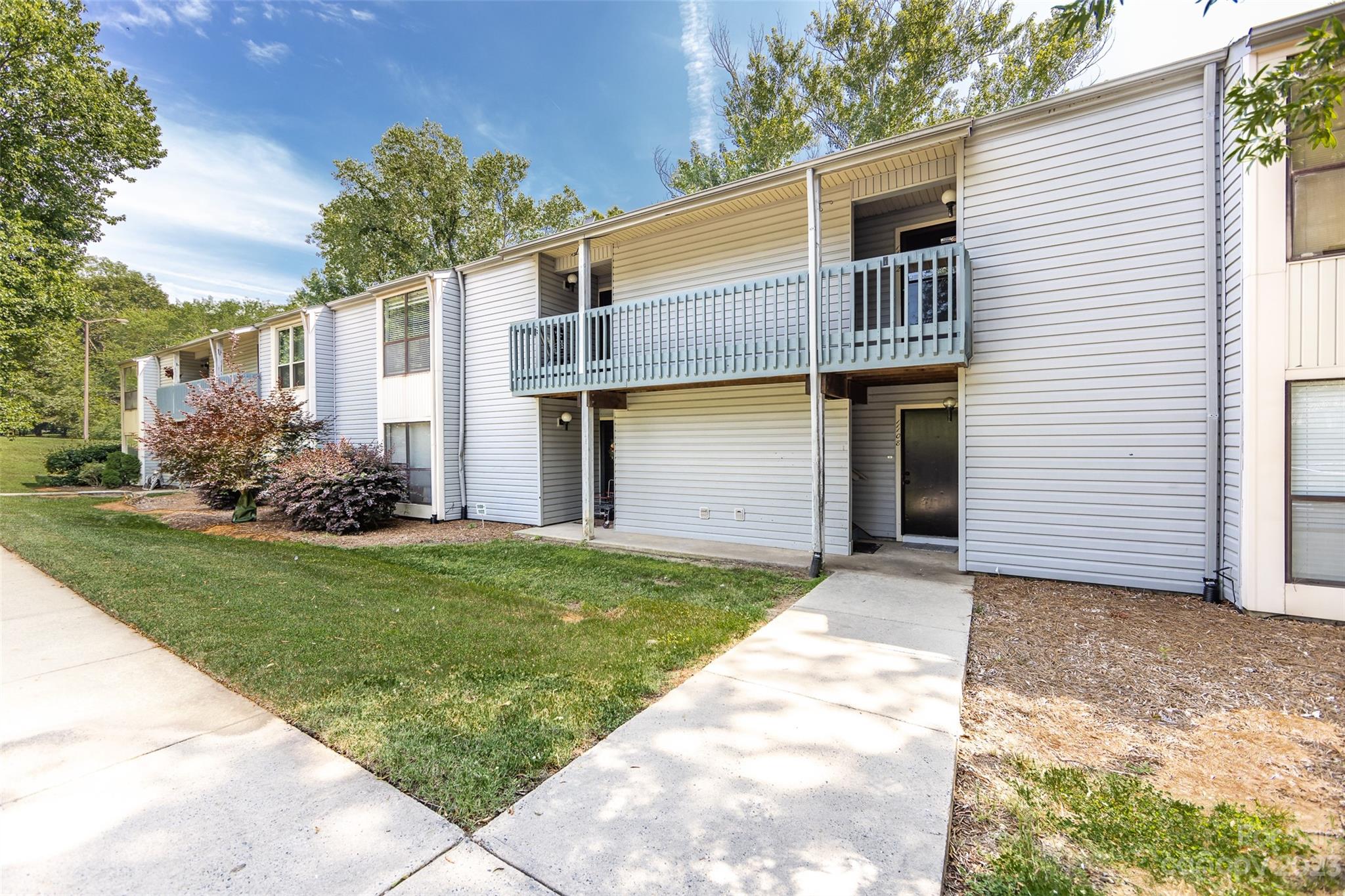 11114 Harrowfield Road Charlotte, NC 28226 - Photo 3 of 25 a view of a back yard of the house