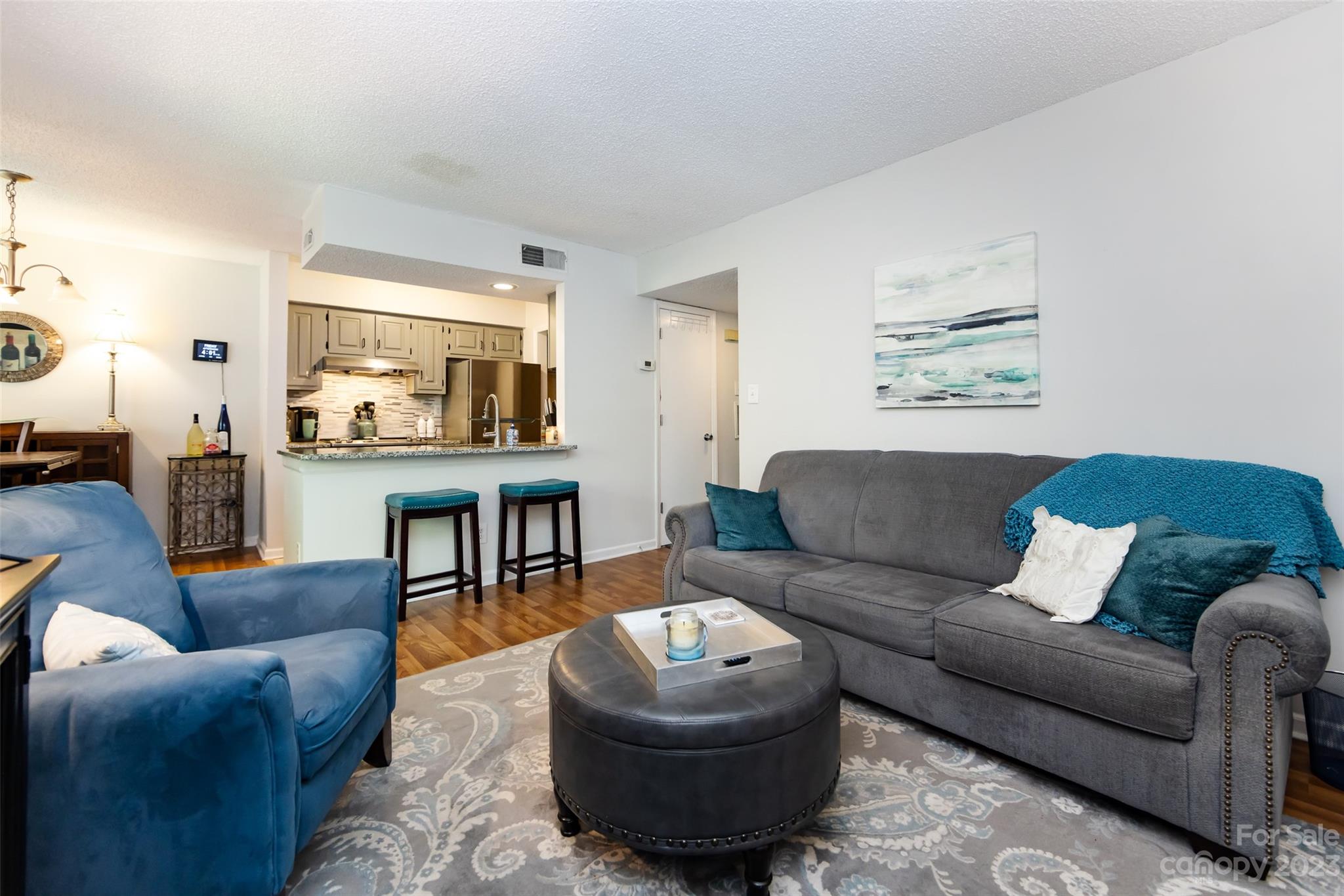11114 Harrowfield Road Charlotte, NC 28226 - Photo 10 of 25 a living room with furniture and a fireplace