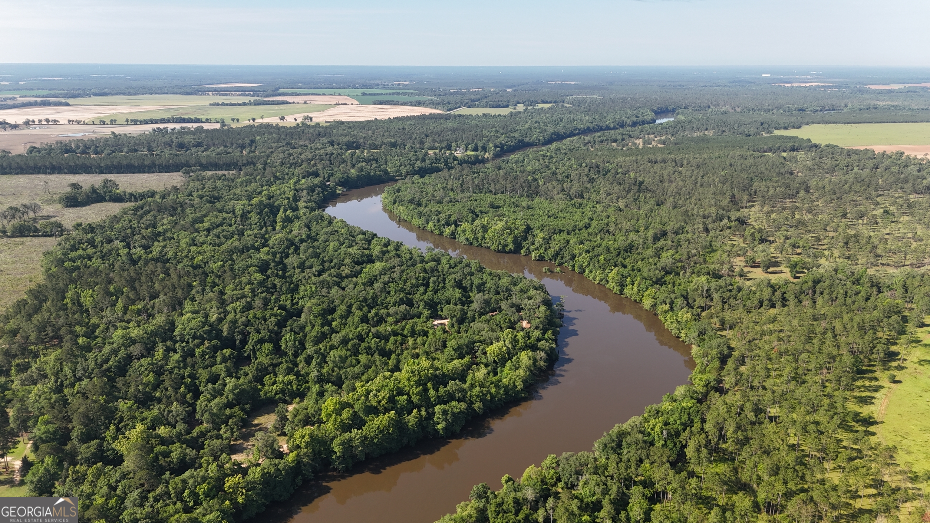 3349 East River Road Bainbridge, GA 39817 - Photo 5 of 18 a view of a lake with a city view