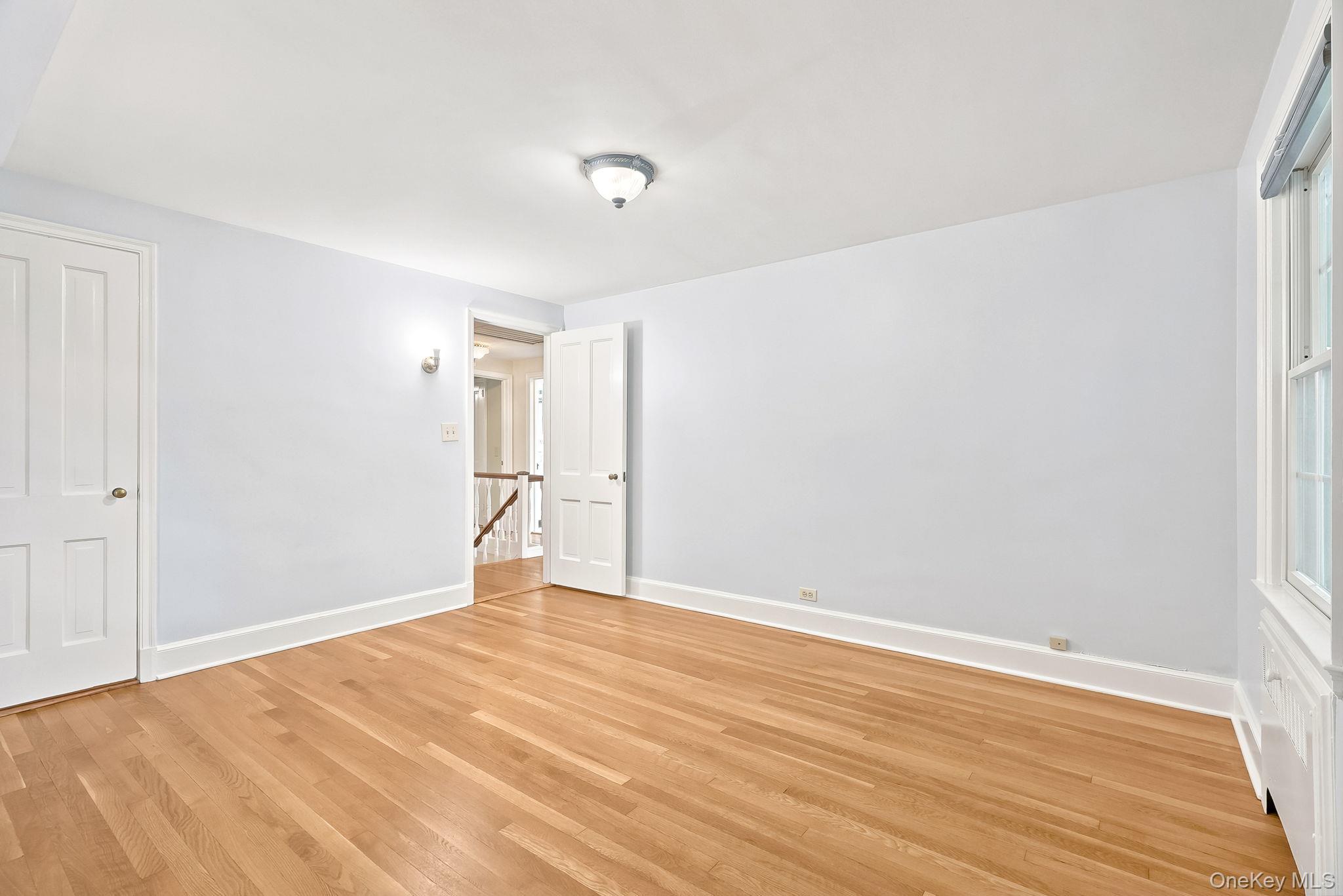 1 Sheridan Road Scarsdale, NY 10583 - Photo 27 of 40 Additional view of the bedroom showing access to the hall and closet door on the left