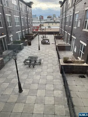 a view of a terrace with chairs