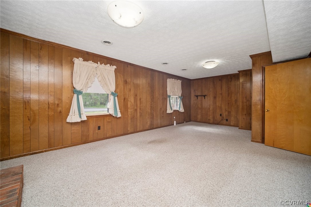 13304 South Chester Road Chester, VA 23831 - Photo 24 of 46 a view of an empty room with a window