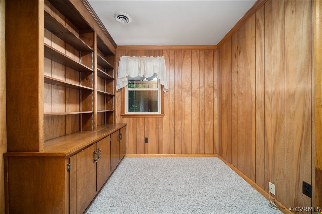 13304 South Chester Road Chester, VA 23831 - Photo 29 of 46 a view of walk in closet with empty racks